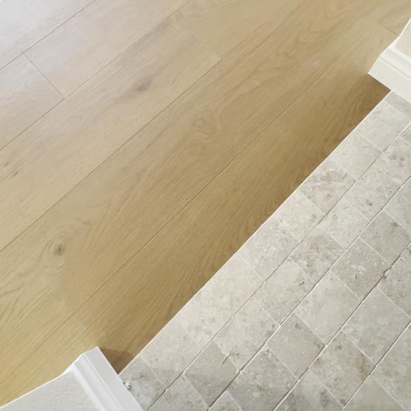 Engineered hardwood meeting a tile floor