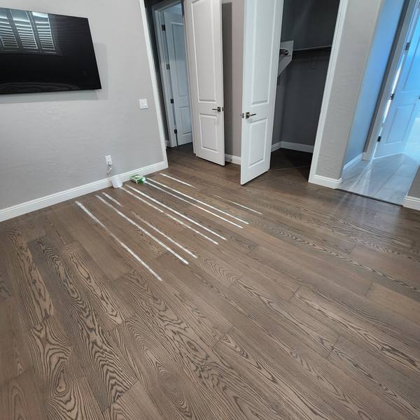 Engineered hardwood in a sunlit bedroom
