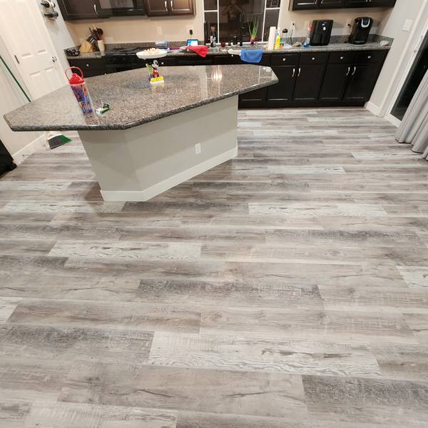Gray plank flooring in a kitchen