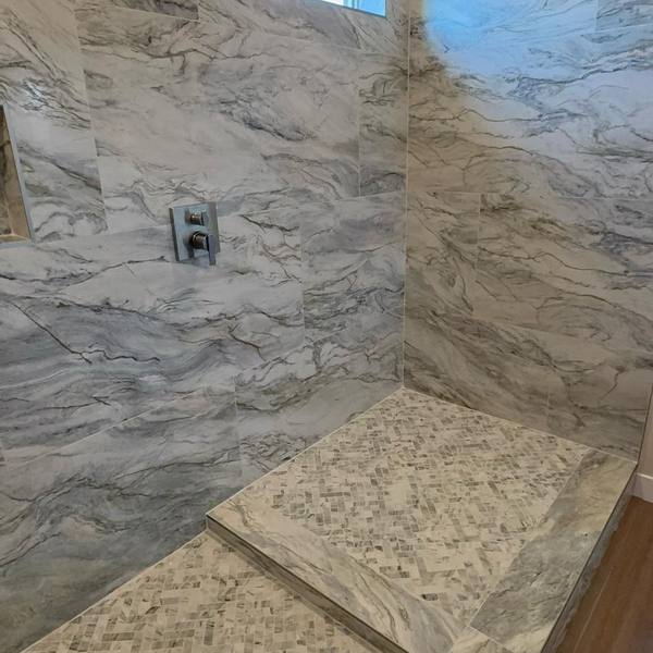 Shower bench and herringbone mosaic floor
