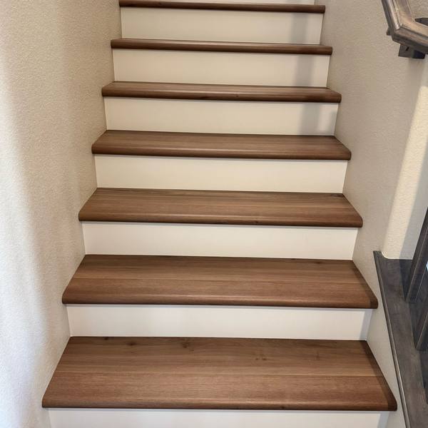 Stair treads with white risers, from the bottom step