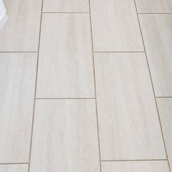 Light tile floor in a bathroom