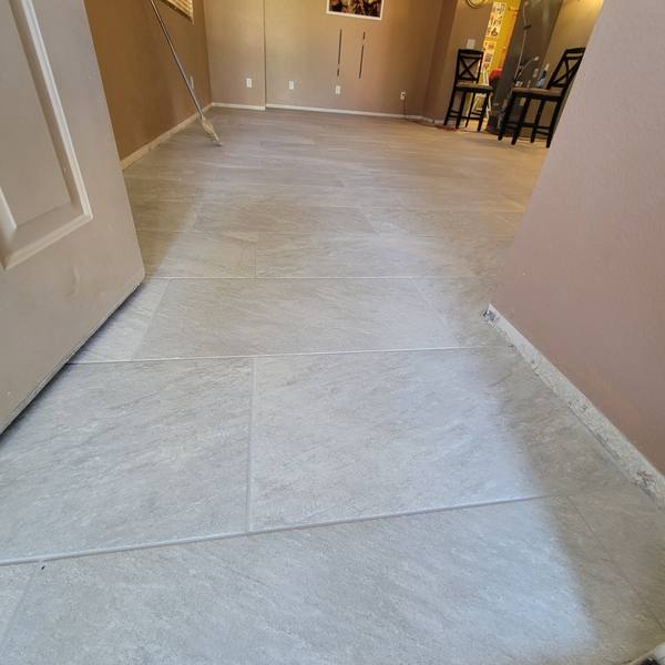 Gray tile floor at a front entry