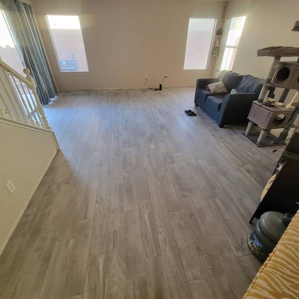 Gray wood-look plank tile in a living room