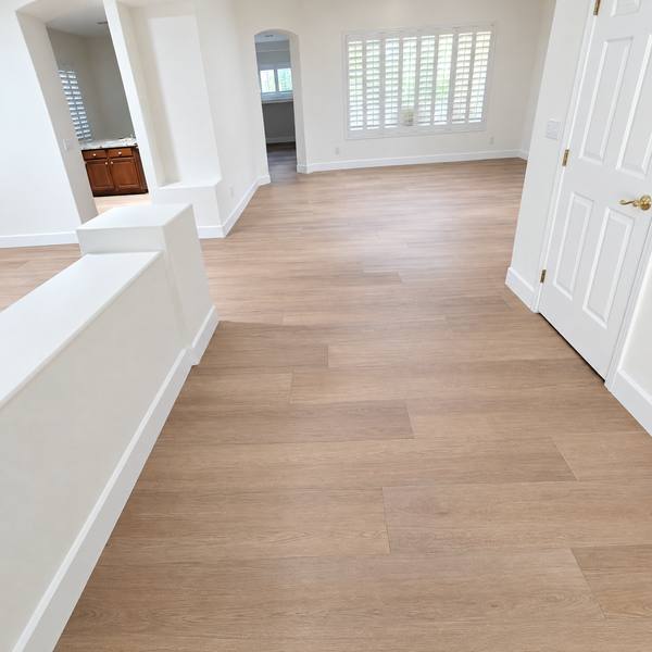 12x72 wood-look tile from the entry into the living room