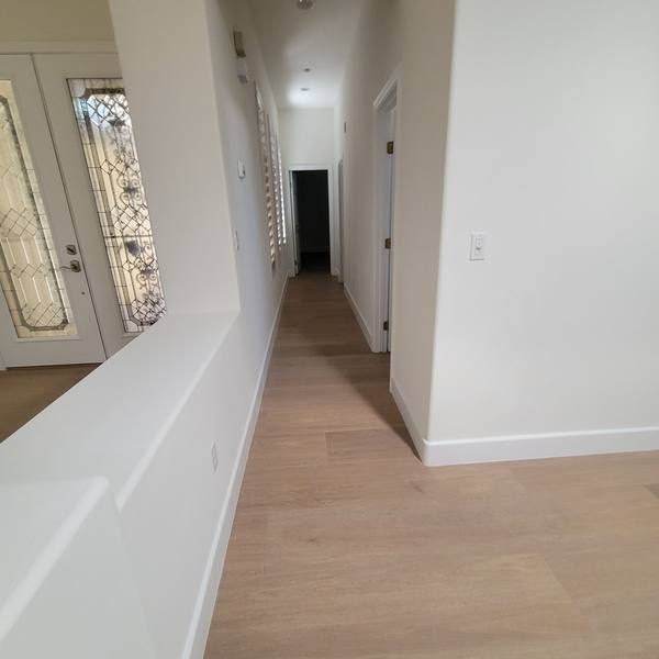 12x72 wood-look tile in a hallway by the front doors