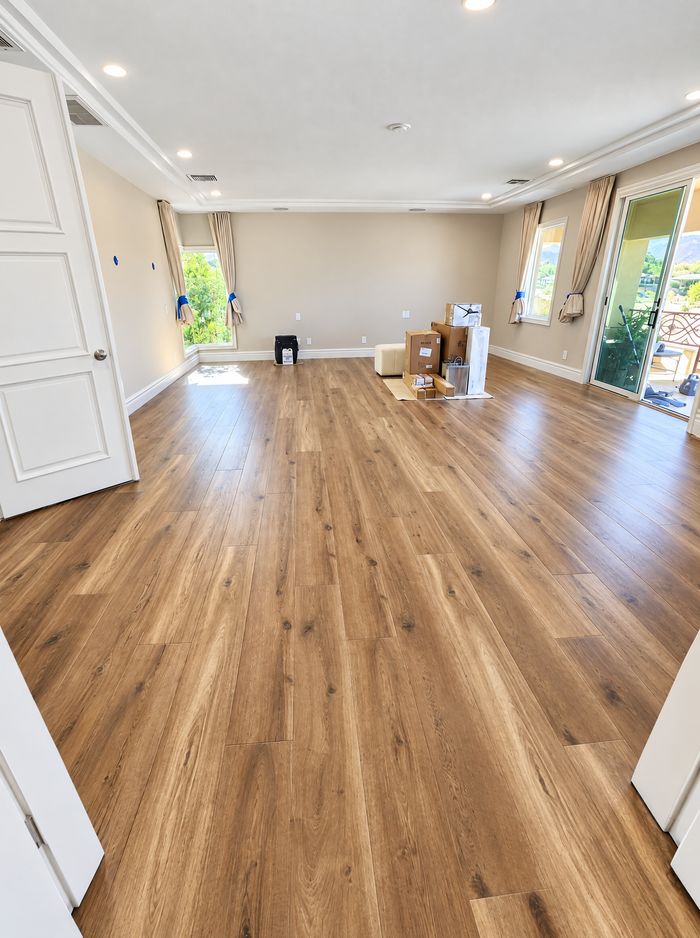 Same bedroom finished in plank flooring