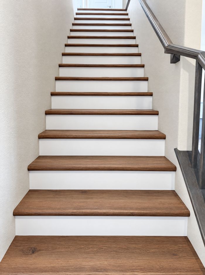 Finished staircase with new treads and white risers
